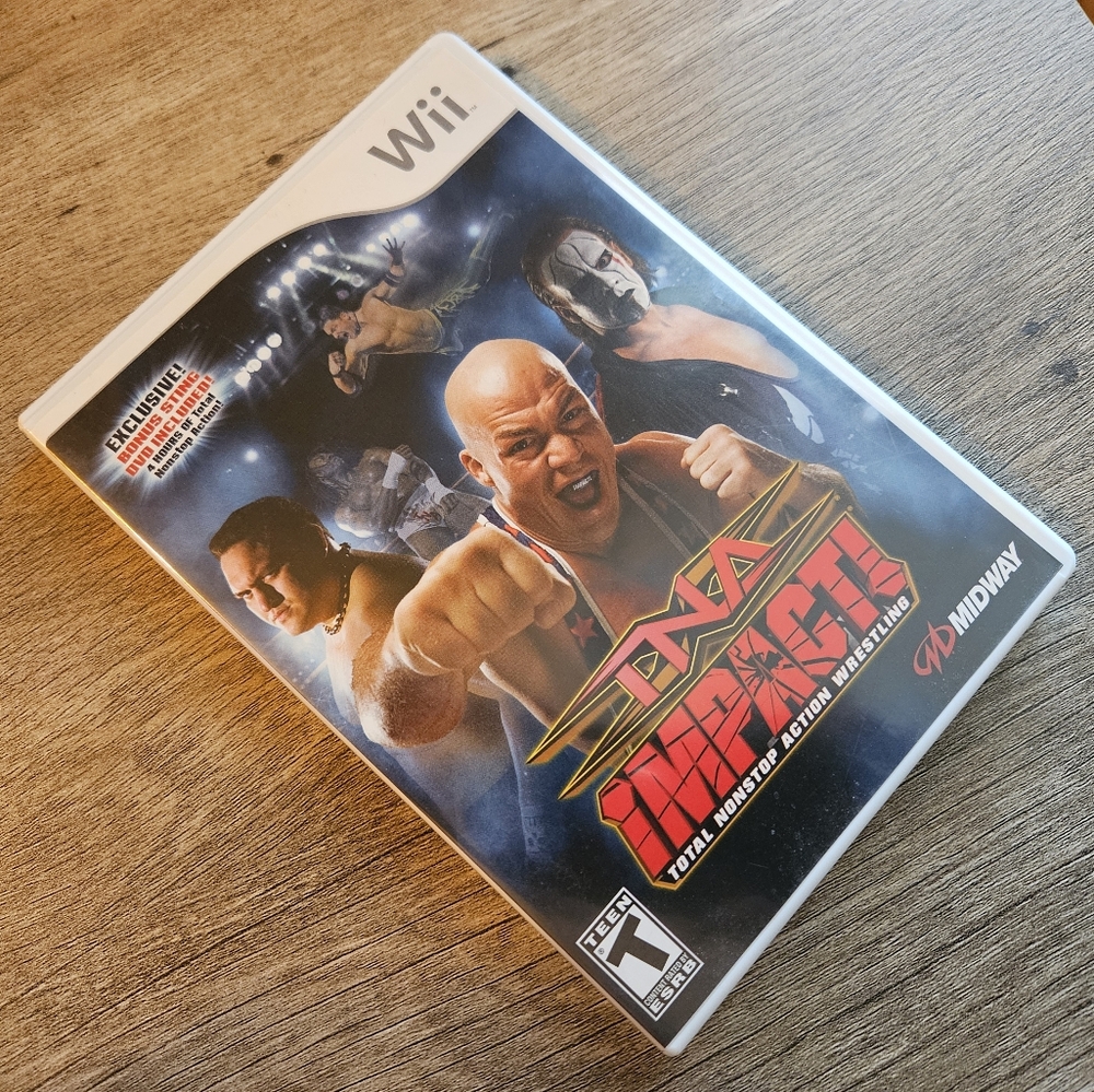 TNA Impact (Wii -- Complete w/ Sting DVD)